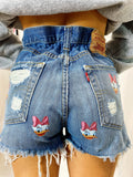Short Levi’s Vintage con stampa topolino sfrangiato chiaro