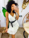 Abito corto bianco glitter con gonna asimmetrica