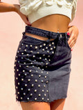Gonna di jeans con borchie e trasparenze nera