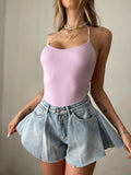 Body aderente con incroci lilla