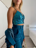 Top con paillettes petrolio