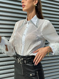 Camicia bianca con strass