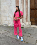 Completo maglia crop e pantalone Fuxia