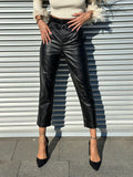 Pantalone in ecopelle con cintura