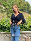 Blusa nera bottoncini oro