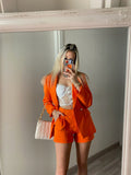 Completo giacca e short arancio