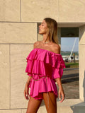 Tutina Fuxia scollo a barchetta e balze