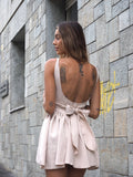 Abito beige schiena aperta e fiocco