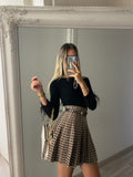 Maglioncino crop nero con piume