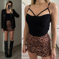 Top nero con anelli oro