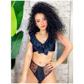Bikini scollo a barchetta con trasparenze a pois
