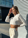 Maglioncino crop panna a trecce