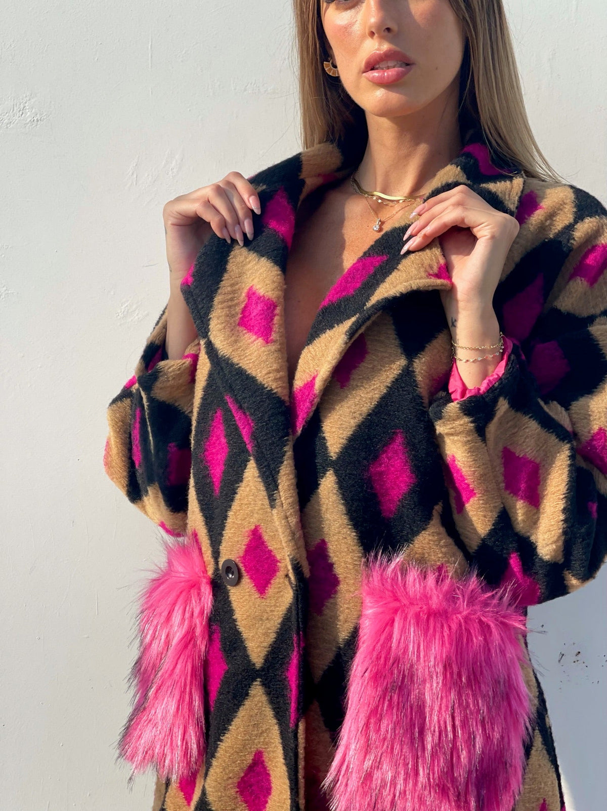 Cappotto a rombi fuxia