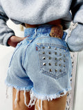 Short Levi’s Vintage bagno chiaro con borchie