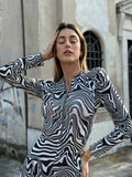Tuta vertigo con zip