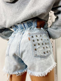 Short Levi’s Vintage bagno chiaro con borchie