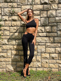 Completo top e pantalone nero con catene
