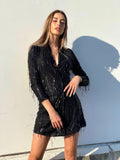 Abito nero frange in paillettes