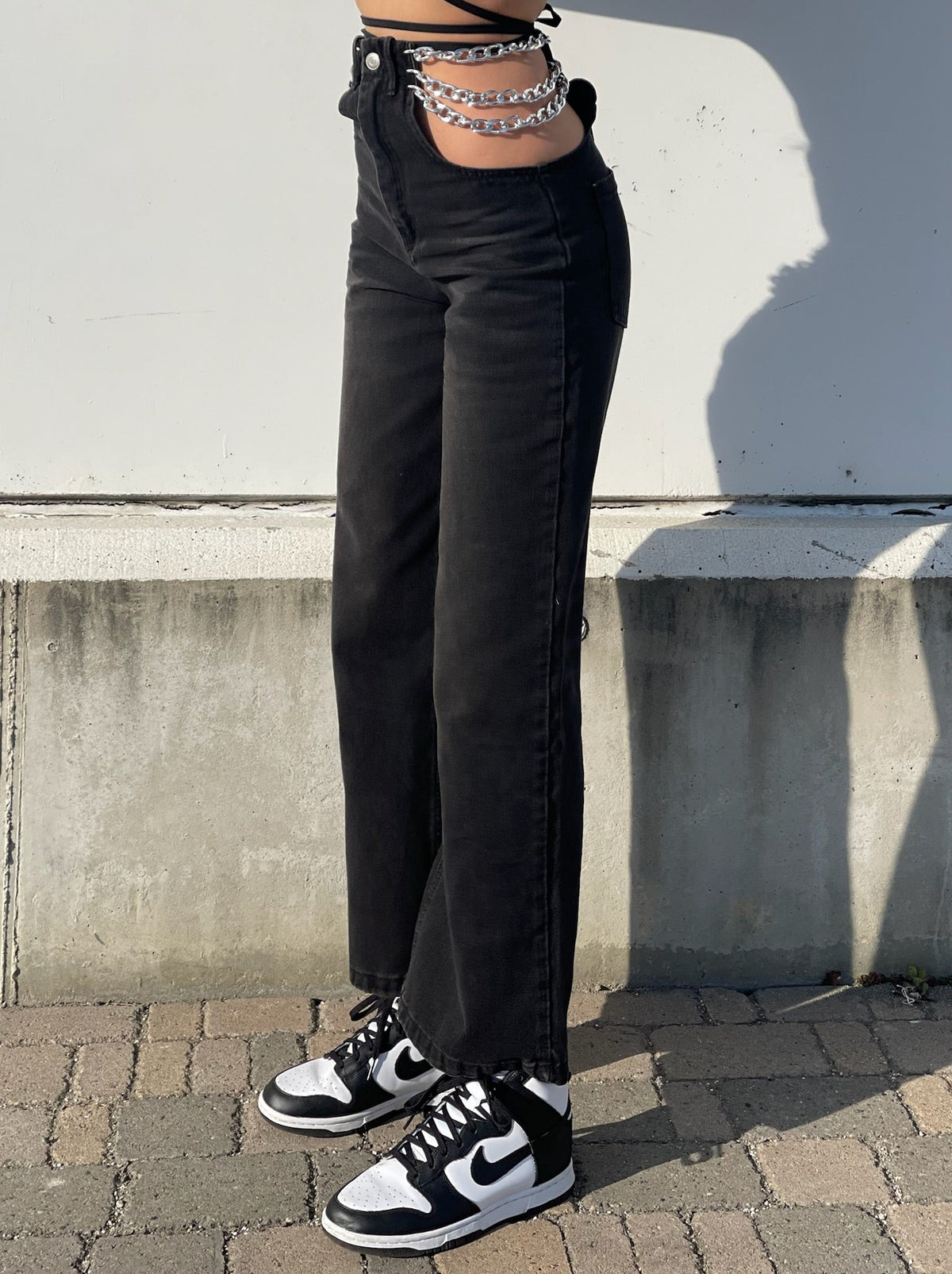 Jeans nero con doppia catena argento