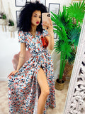 Abito lungo con maxi spacchi a fiori base celeste
