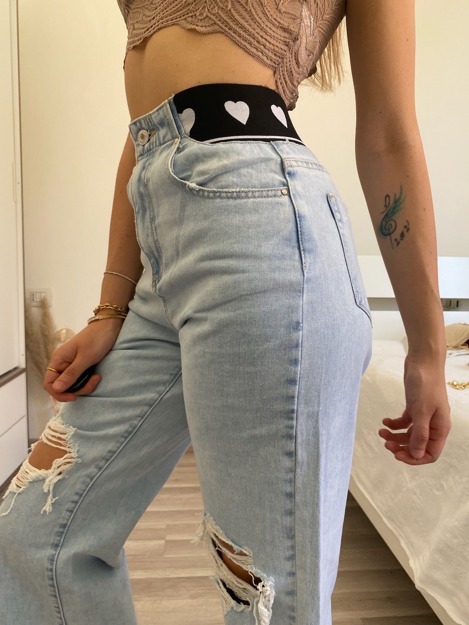 Jeans con elastico e cuori
