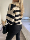 Pull nero e panna con colletto