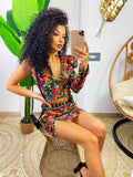 Completo top e gonna con fiori arancio base nera