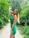 Abito a bretellina verde con incroci
