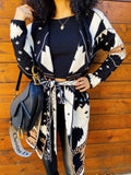 Cardigan camel nero con frange e cinta