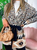 Cardigan maculato con frange e cinta