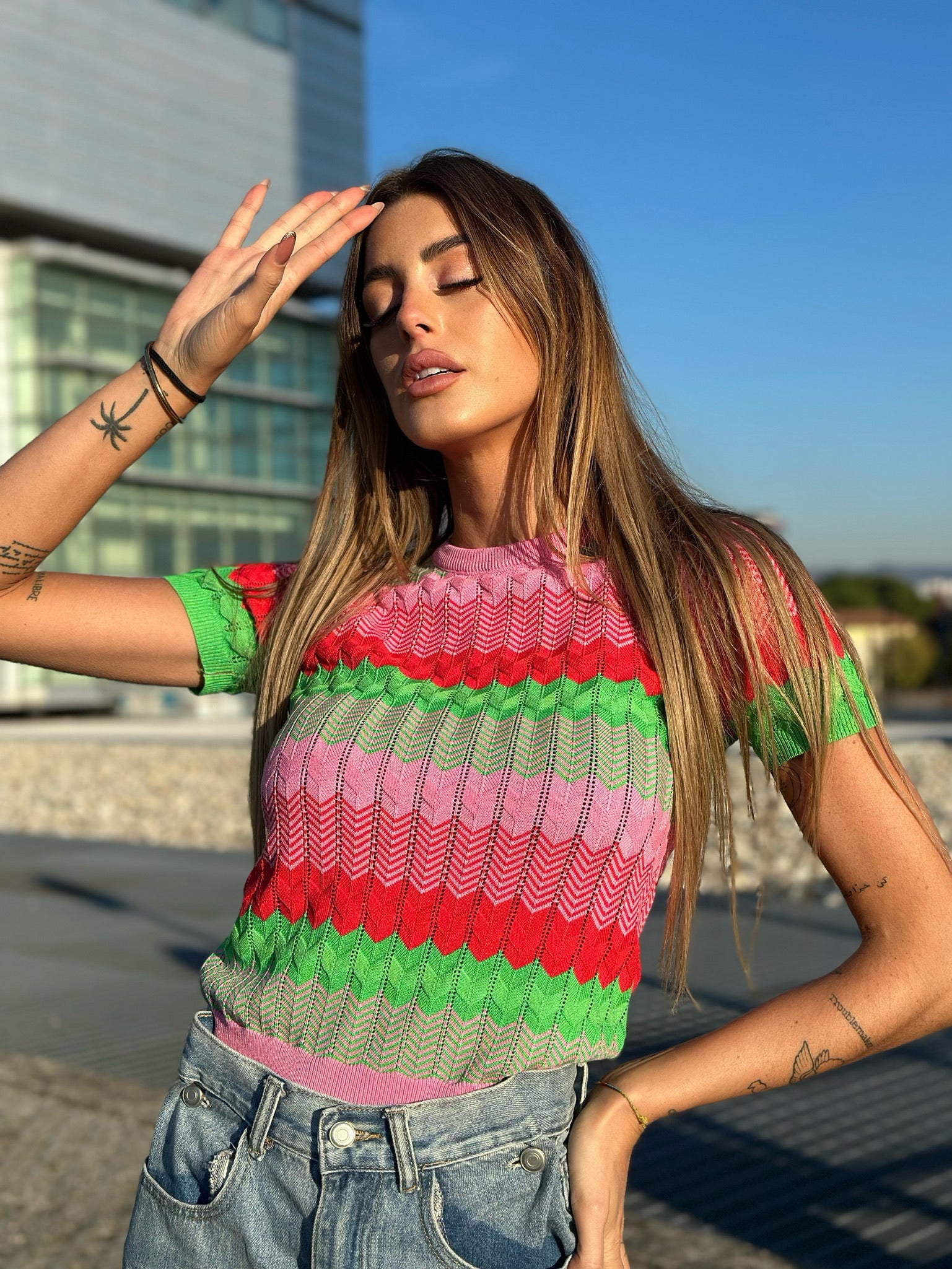 Maglia rosa e verde con cuori