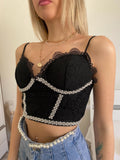Top in pizzo con perle nero