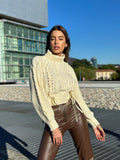 Maglione panna con trecce