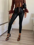 Pantalone in ecopelle con strass