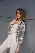 Tuta beige con zip