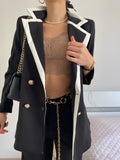 Completo giacca e pantalone nero e bianco