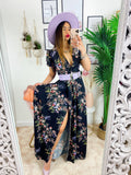 Abito lungo con maxi spacchi a fiori nero manica corta