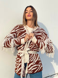 Cardigan zebrato beige con frange e cinta