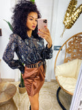 Blusa con ricami nera