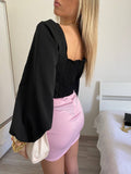 Top con bottoncini nero