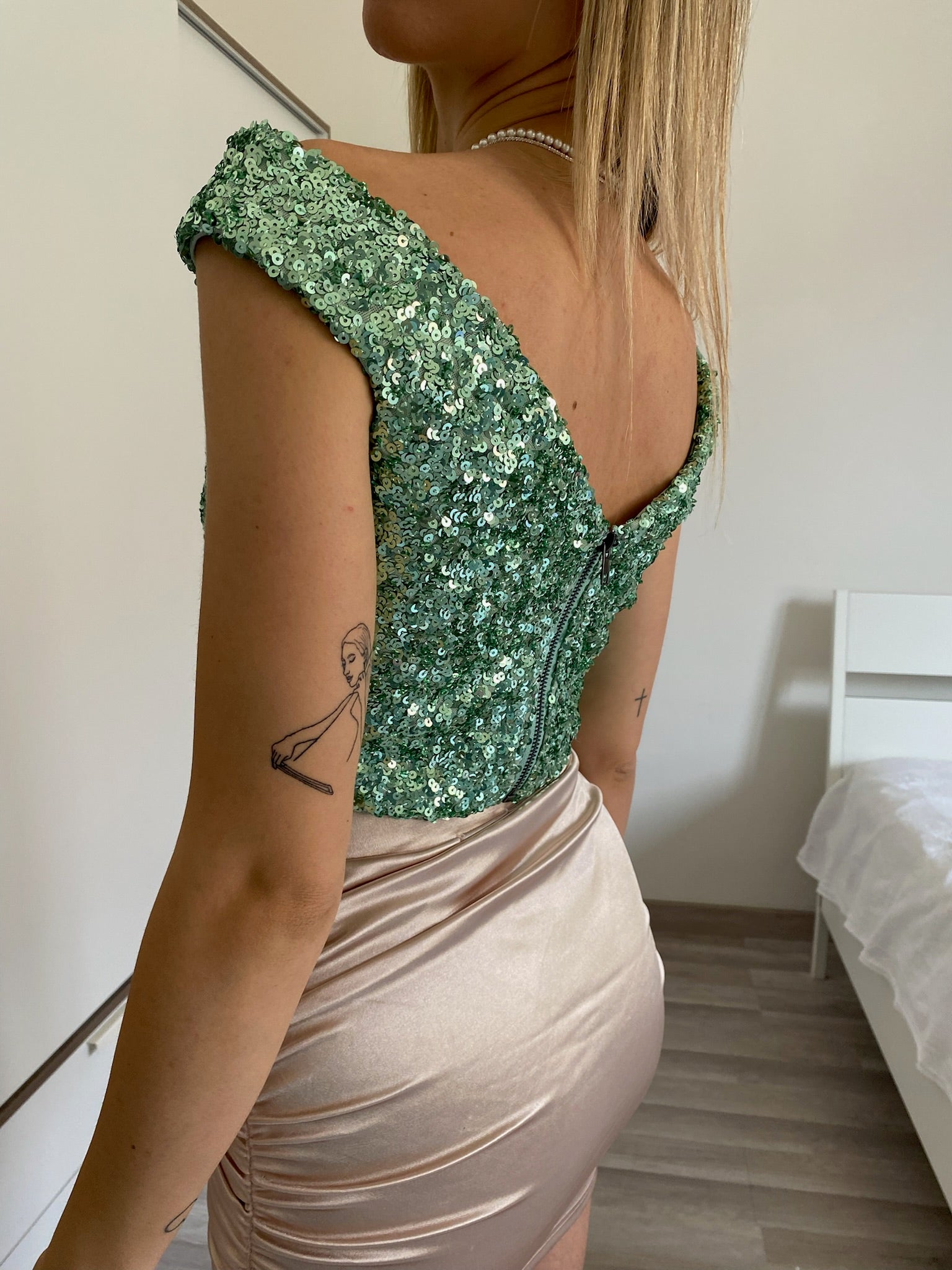 Top Verdeacqua con paillettes