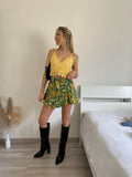 Top in pizzo giallo con pizzo