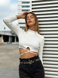 Top bianco a costine con lacci