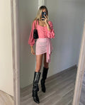 Top con bottoncini rosa