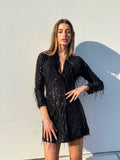 Abito nero frange in paillettes
