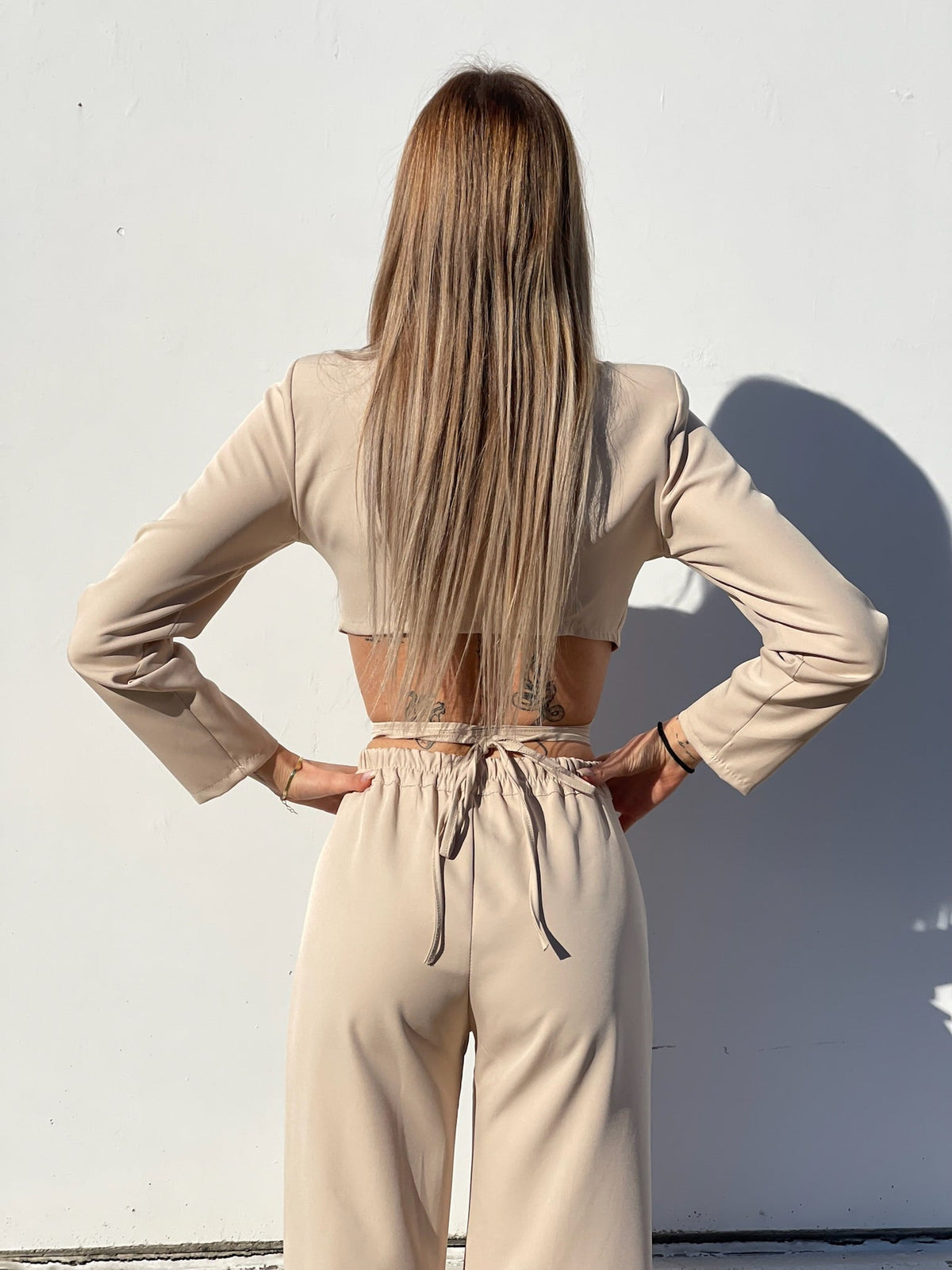 Completo top e pantalone beige