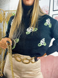 Maglione collo alto con rose nero
