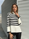 Maglione a righe collo alto