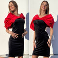 Abito in velluto con maxi fiocco rosso