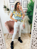Camicia smanicata con borsetta base celeste